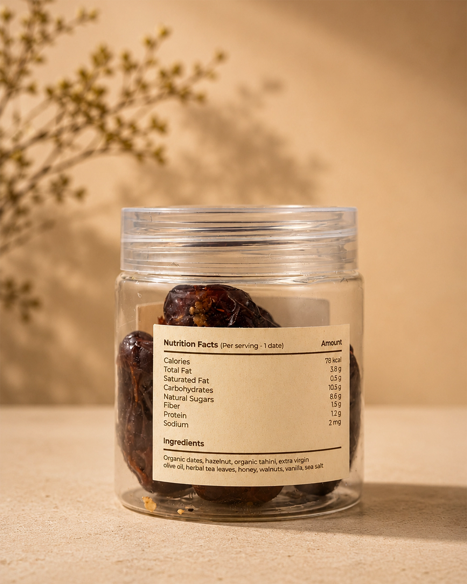 Back view of Saco Tea Blush Heart Dates jar showing the nutrition facts label on a beige surface.