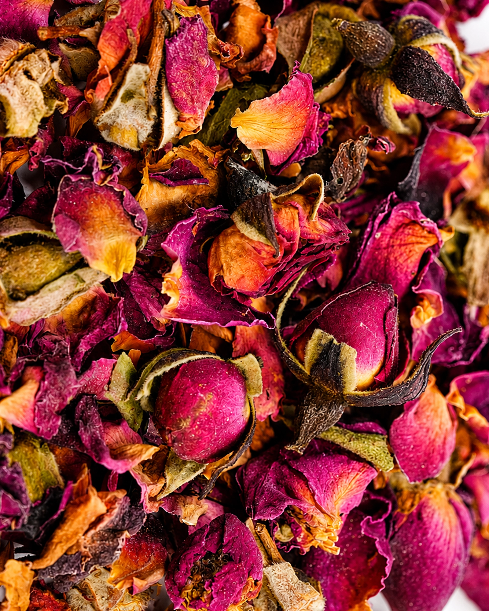 Close-up of dried rose petals and rosebuds used in Rosie Tea.