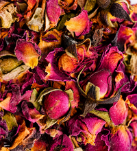 Close-up of dried rose petals and rosebuds used in Rosie Tea.